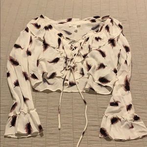 Cropped longe sleeve feathered blouse